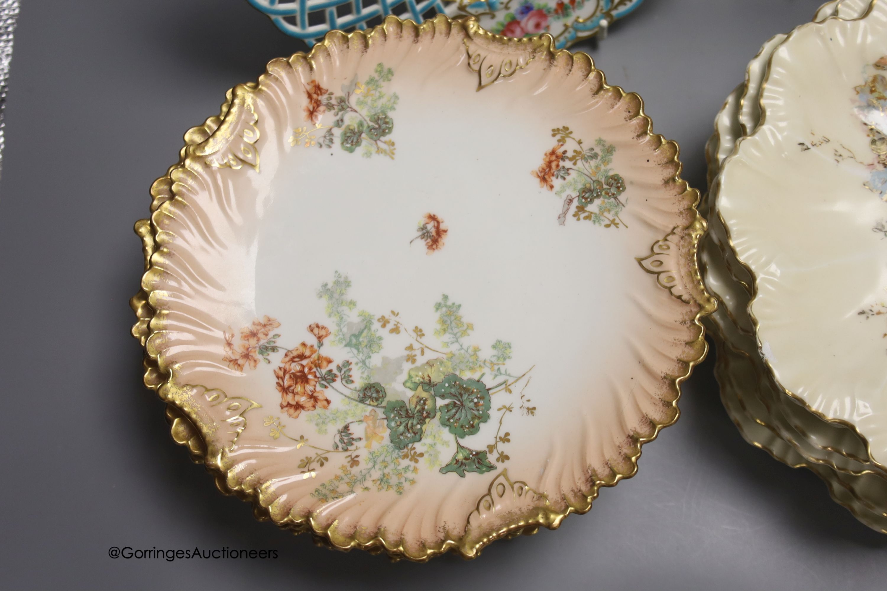 Two sets of six Limoges dessert plates, three English porcelain ribbon plates, an Alfred Pearce Aynsley dessert plate and a Worcester cup and saucer